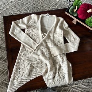 Beige sweater size Small I. Great used condition